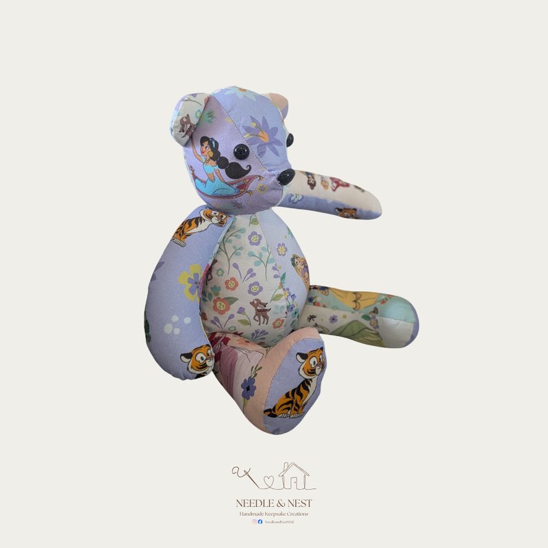 Handmade memory bear by Needle and Nest made from lilac and pastel floral baby clothing - Disney themed personalised keepsake