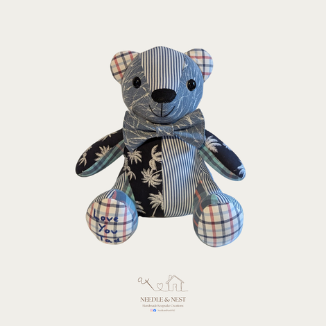 Handmade memory bear by Needle and Nest made from blue striped shirts and checked fabric with Love You Dad embroidered on foot - personalised keepsake gift