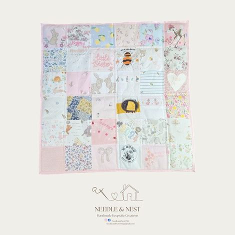 Patchwork memory blanket by Needle and Nest made from baby girl clothing with bunny, bee, Bambi and floral print squares in pink and white