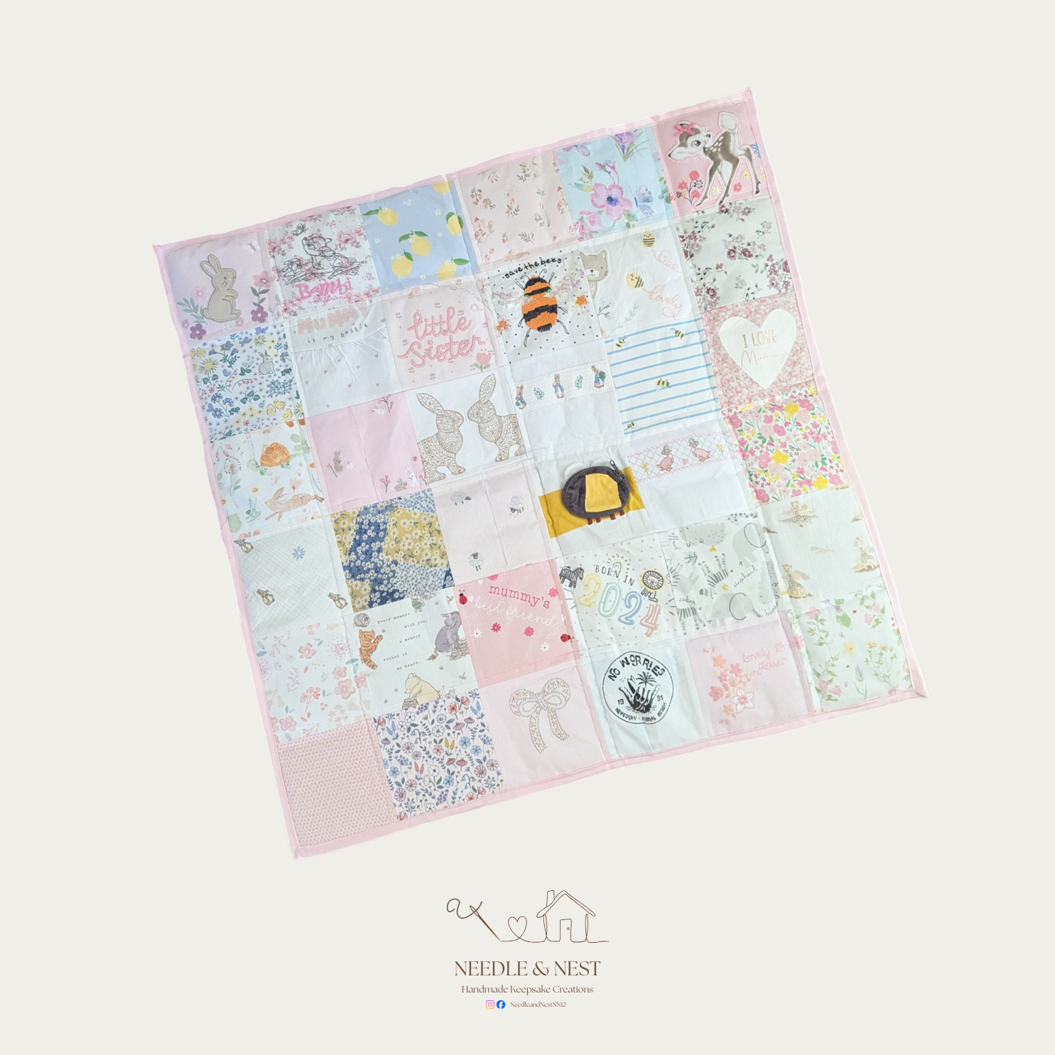 Standard memory blanket made from pastel baby clothes with animal and floral designs
