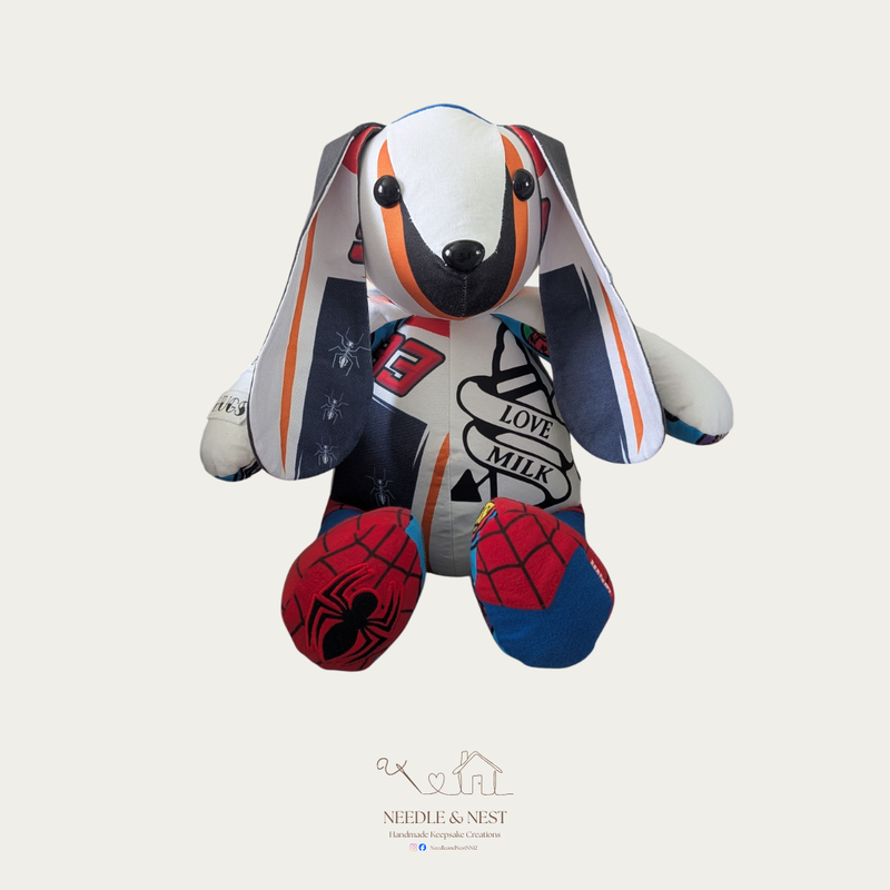 Handmade standard memory bear by Needle and Nest made from colourful children's clothing with Spiderman and love heart details